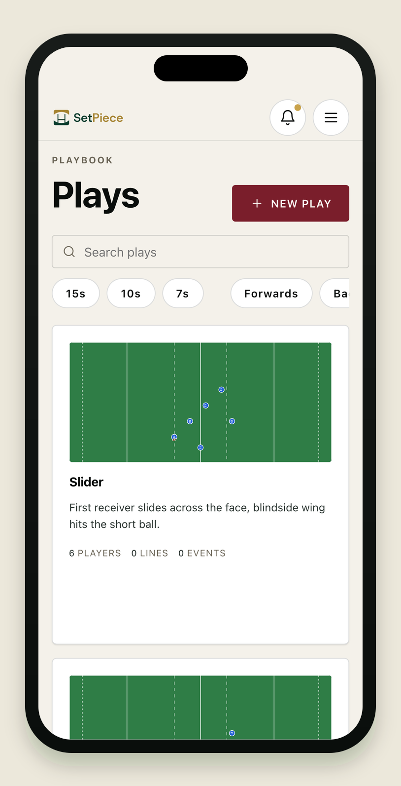 The SetPiece playbook list on an iPhone — the searchable library of plays a coach drops into sessions. Header reads 'Playbook · Plays' with a navy '+ New play' button. Below, a search bar 'Search plays…' and a row of game-mode and band filter chips (15s, 10s, 7s, Forwards, Backs). The first play is 'Slider', shown with a thumbnail of its rugby pitch and metadata badges for players, lines and events.