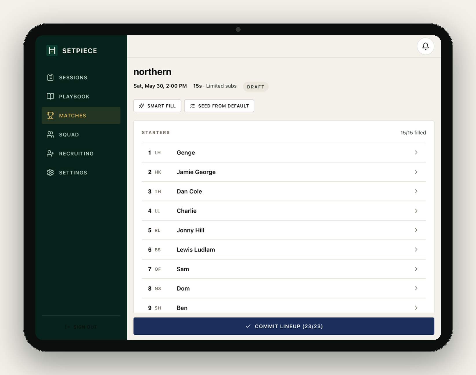 Match-day lineup on a tablet. The left sidebar holds the navigation (Sessions, Playbook, Matches, Squad, Recruiting, Settings). The workspace shows the 'northern' match — Sat, May 30, 2:00 PM, 15s, Limited subs, marked DRAFT — with two helpers above the list: 'Smart fill' and 'Seed from default'. A 'Starters 15/15 filled' card runs down the page: 1 LH Genge, 2 HK Jamie George, 3 TH Dan Cole, 4 LL Charlie, 5 RL Jonny Hill, 6 BS Lewis Ludlam, 7 OF Sam, 8 N8 Dom, 9 SH Ben, and so on. A pitch-green 'Commit lineup (23/23)' button sits pinned at the bottom of the workspace.