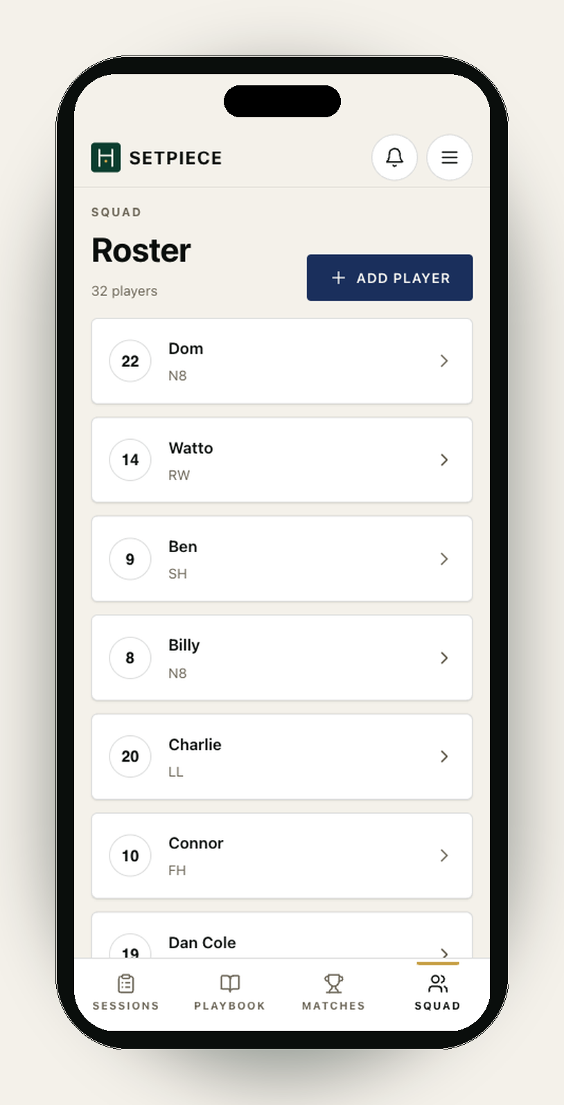 The SetPiece squad view on an iPhone. Header reads 'SQUAD · Roster · 32 players' with a pitch-green '+ Add player' button. Below it, a vertical list of players, each row showing a numbered circular avatar (jersey number), the player's name, and their primary position shorthand: 22 Dom (N8), 14 Watto (RW), 9 Ben (SH), 8 Billy (N8), 20 Charlie (LL), 10 Connor (FH), 19 Dan Cole (TH).